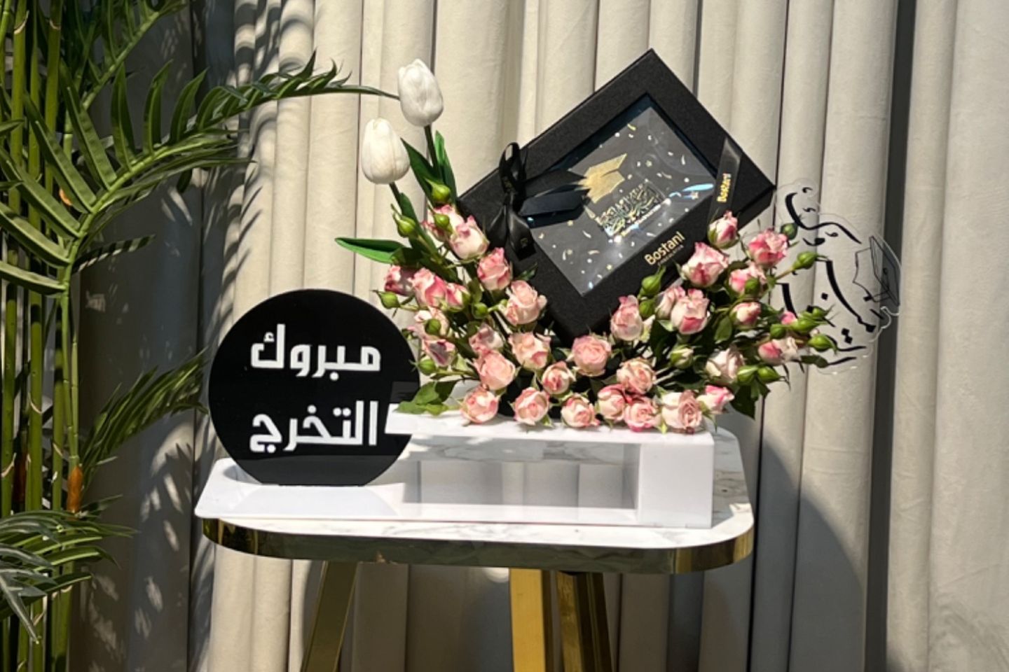 Chocolate Graduation From The Bostani Brand With A Stand And Roses
