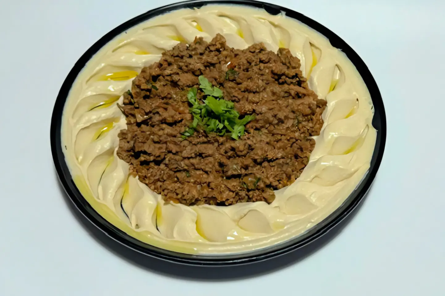 Meat Hamsa With Hummus