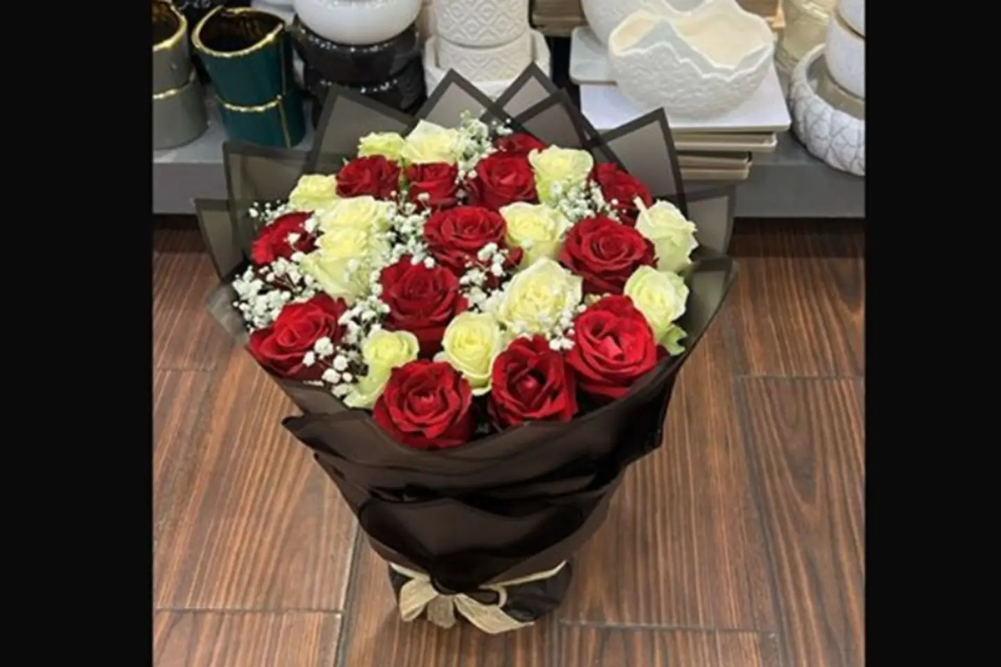 A Bouquet Of Red And White Roses