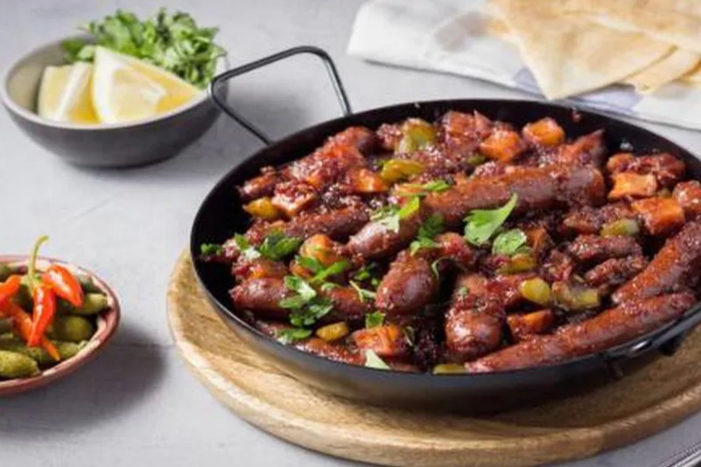 Sausage With Pomegranate Molasses