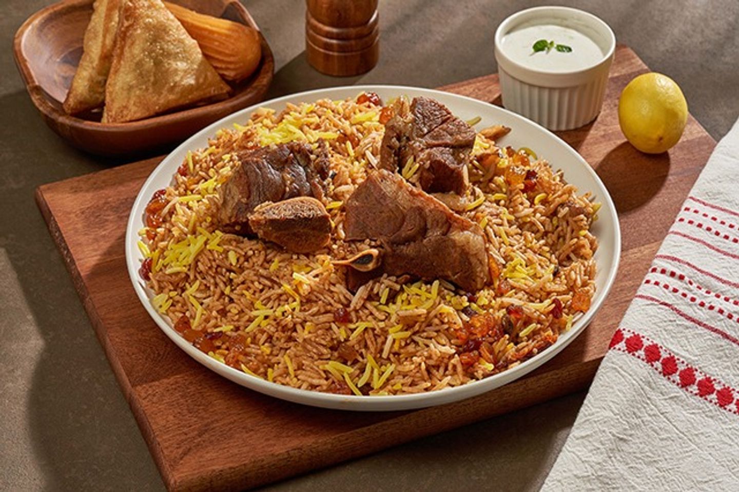 أرز باللحم مع التبع