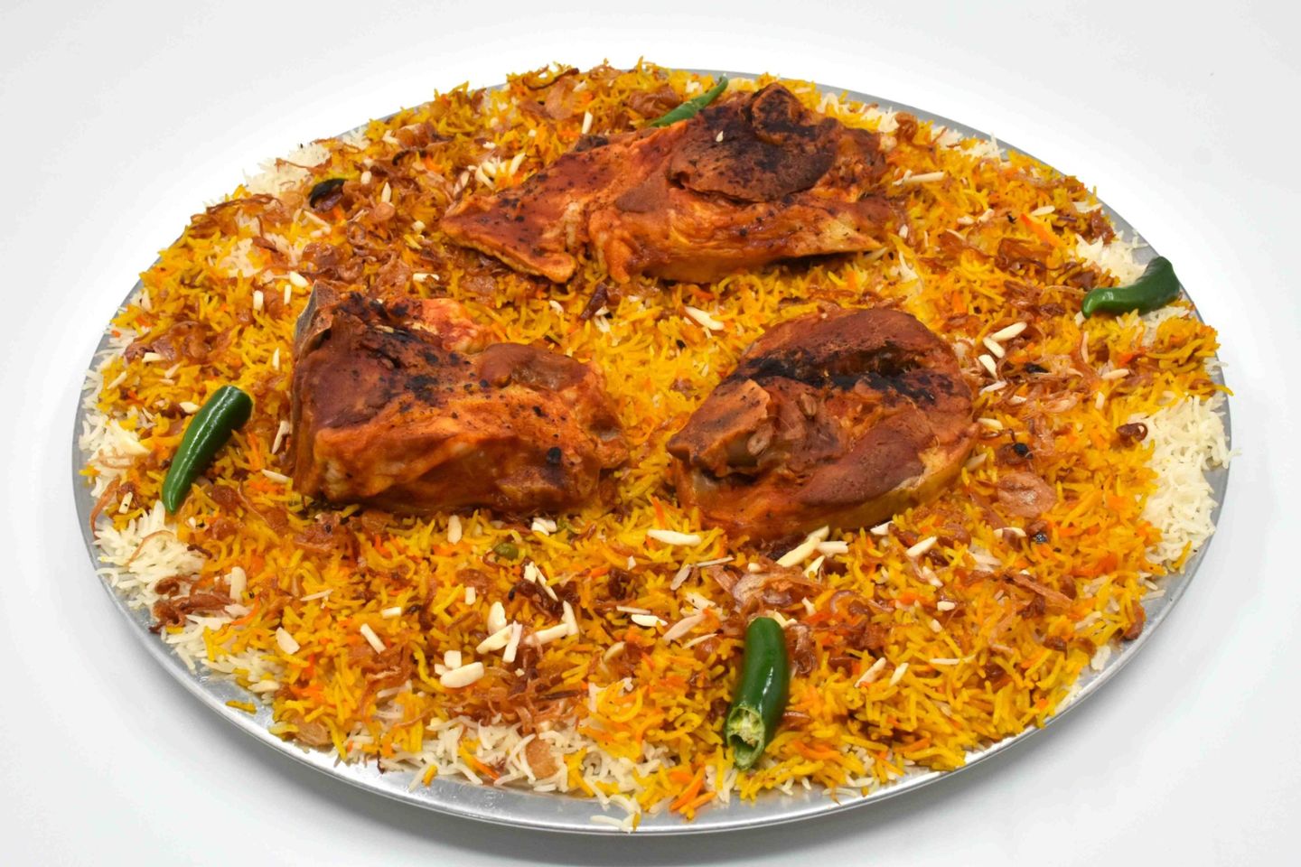 ثلاث قطع صغيرة لحم مع برياني الحرمين حشو