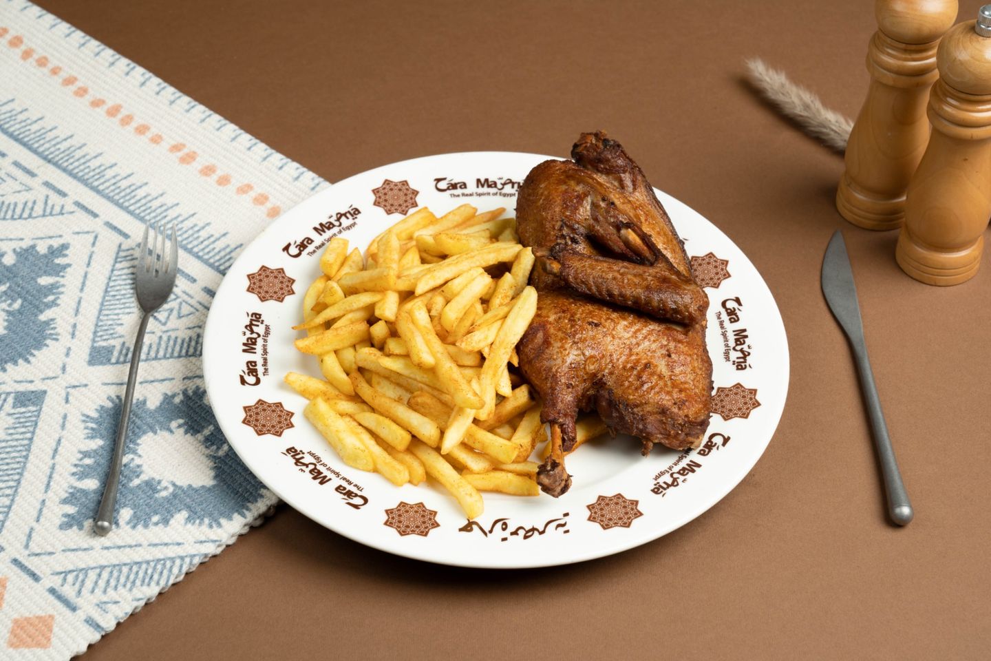 نصف بطة مع الأرز البلدي والملوخية