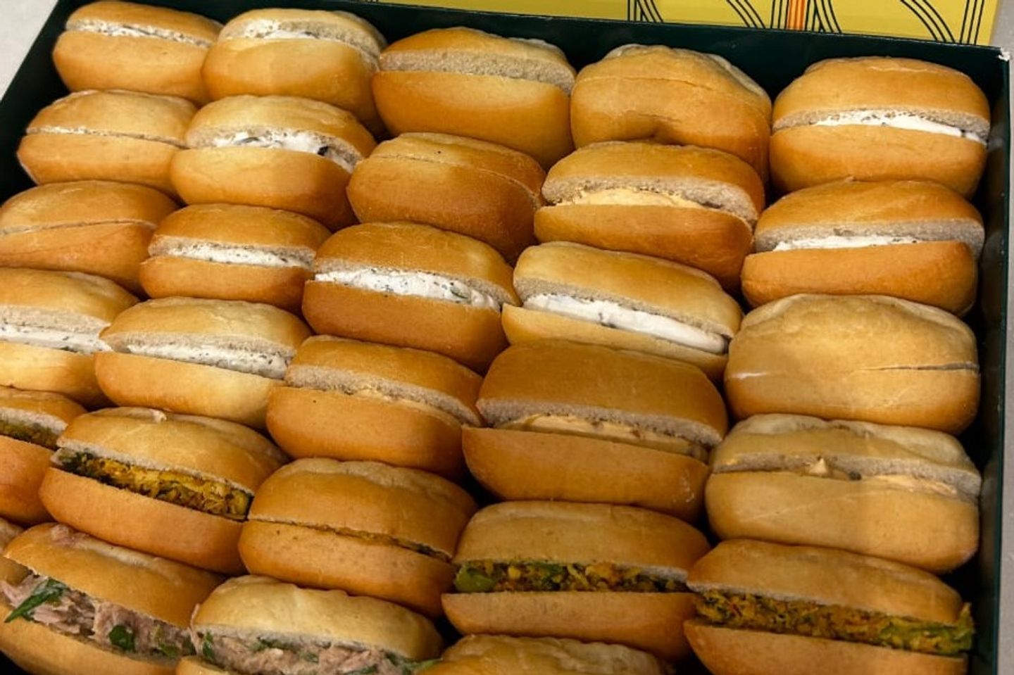 A Box Of 30 Pies With Different Fillings