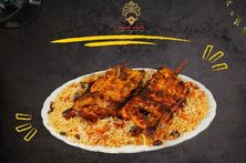 ‎نص على الفحم مع رز بخاري