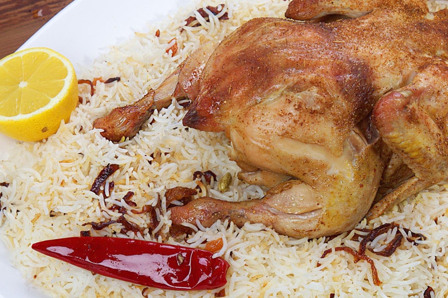 نصف دجاج حنيذ