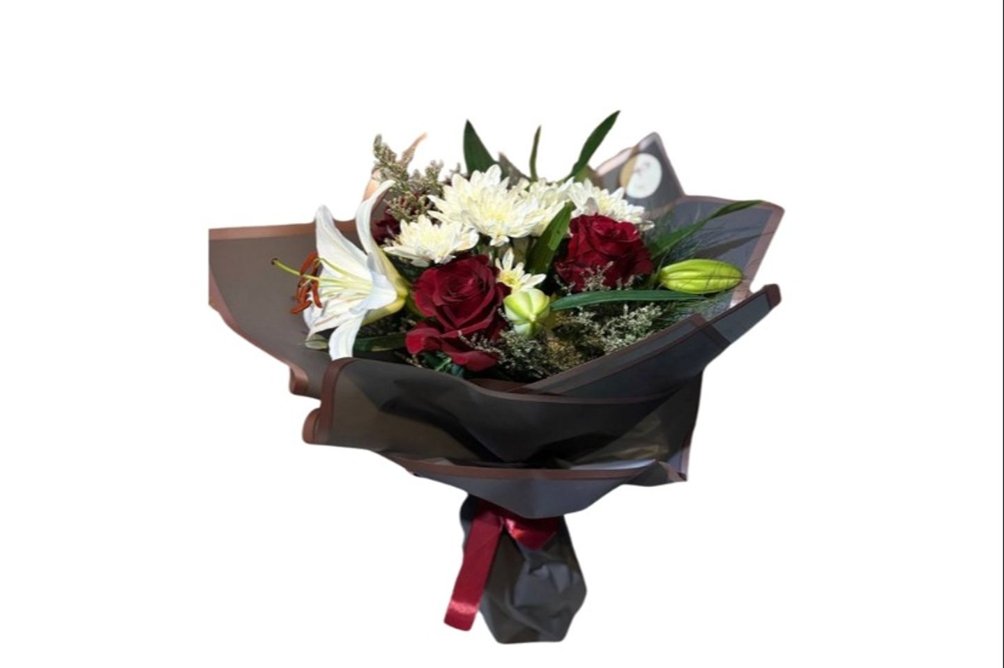 A Bouquet Of Lilies And Red Roses