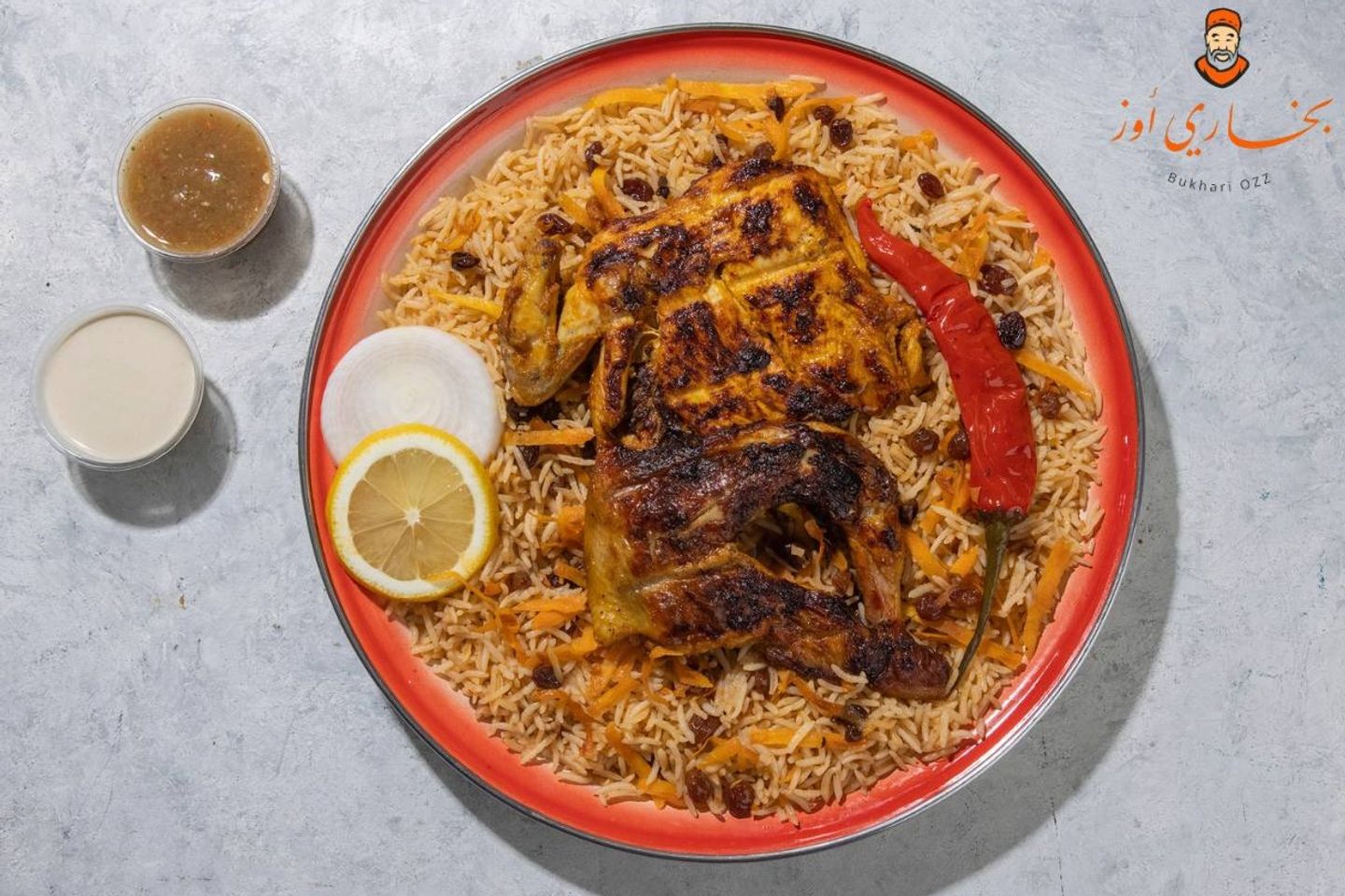 نصف دجاجة جمر مع رز بخاري