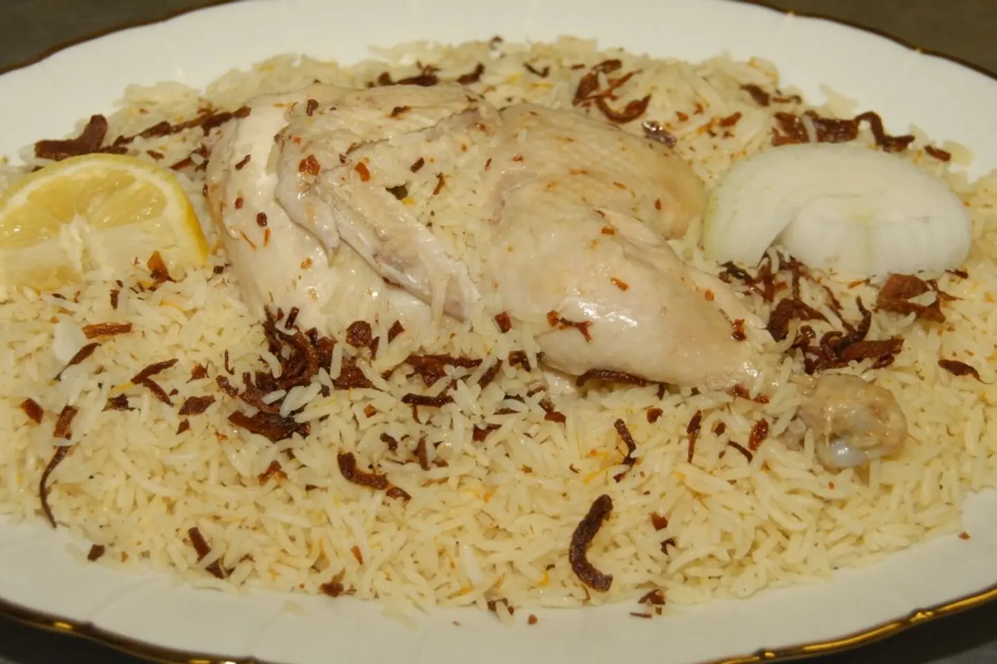 Half Chicken Madghout With Red Rice.