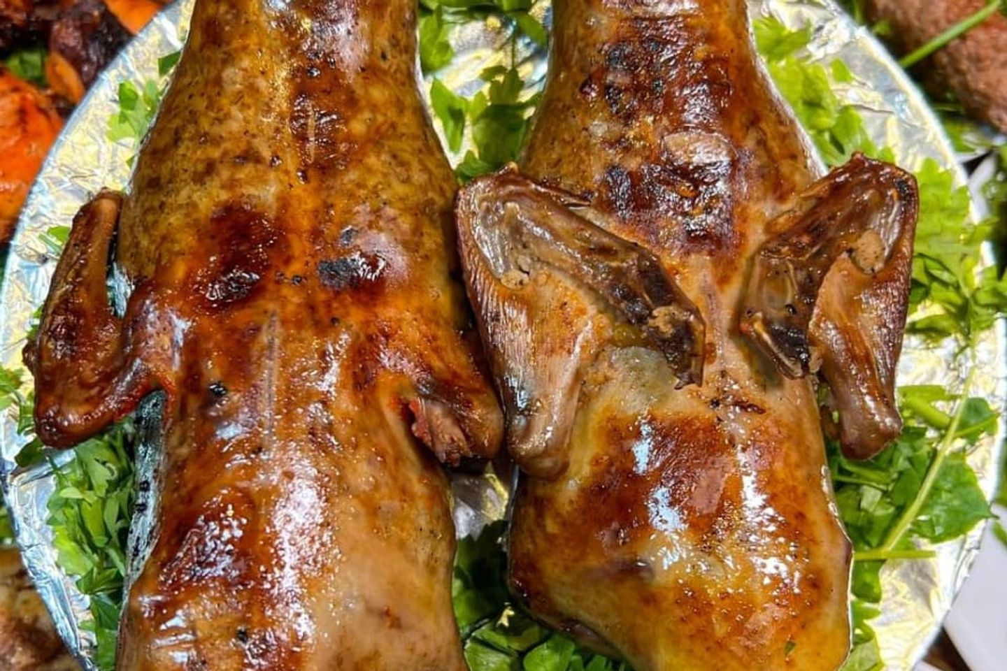 Stuffed Pigeon Grilled Over Charcoal