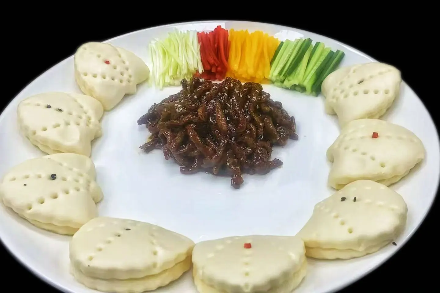 لحم بقر مقطع بصلصة جينغ الحلوة