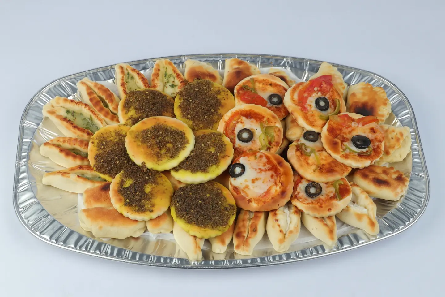 A Plate Of Small Nawashaat Mini Semolina
