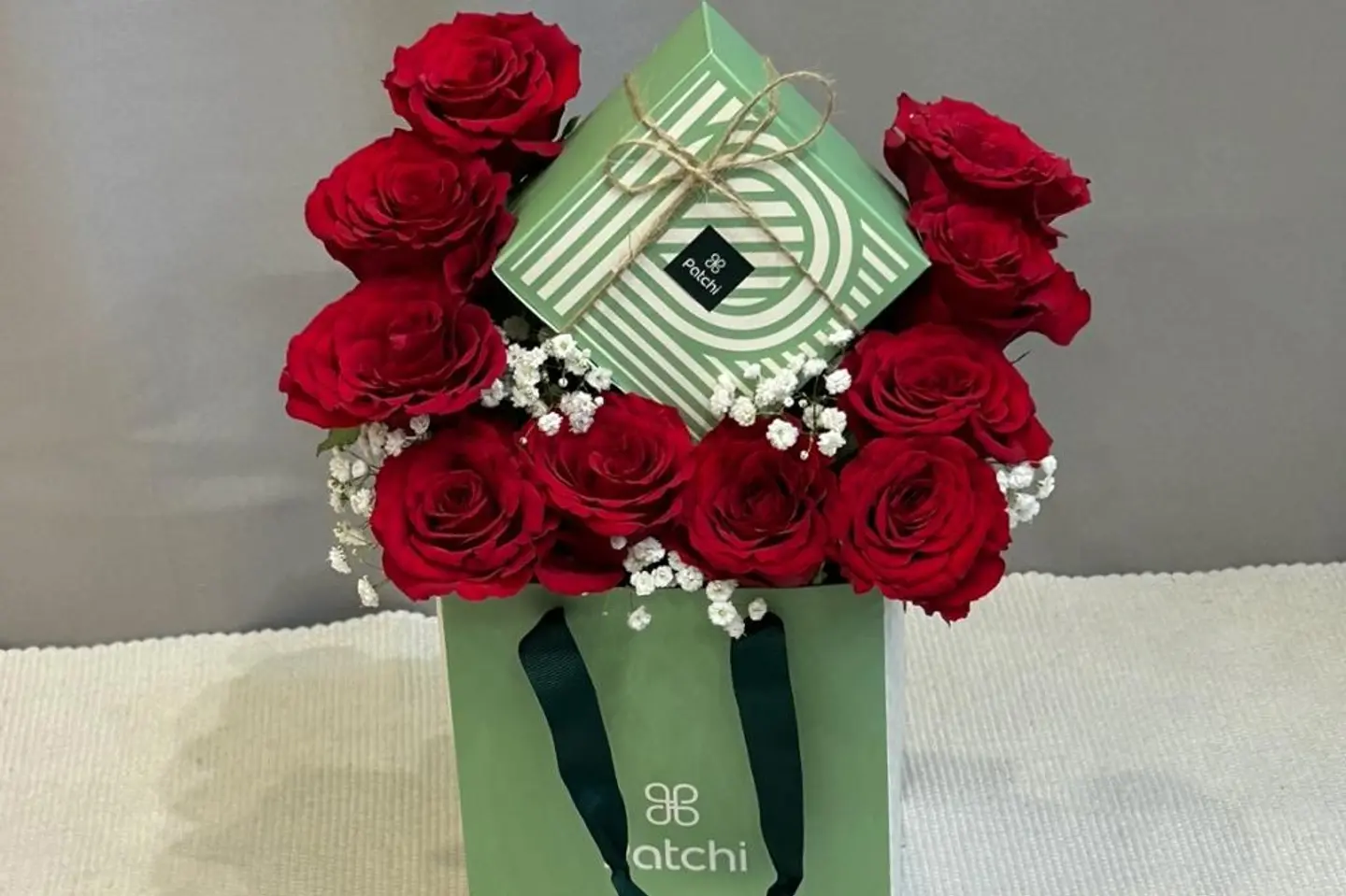 A Quarter Of A Patchi With Red Roses
