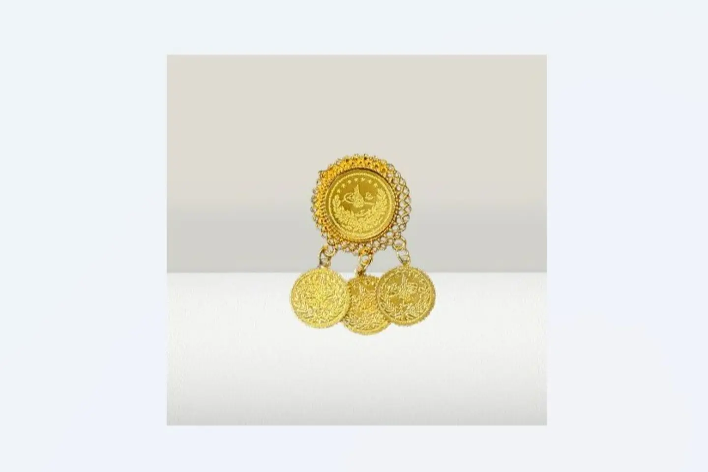 Gold Pound Brooch