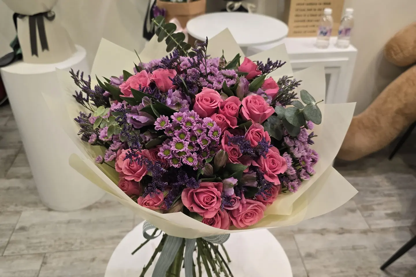 A Bouquet Of Spray Roes And Daisies