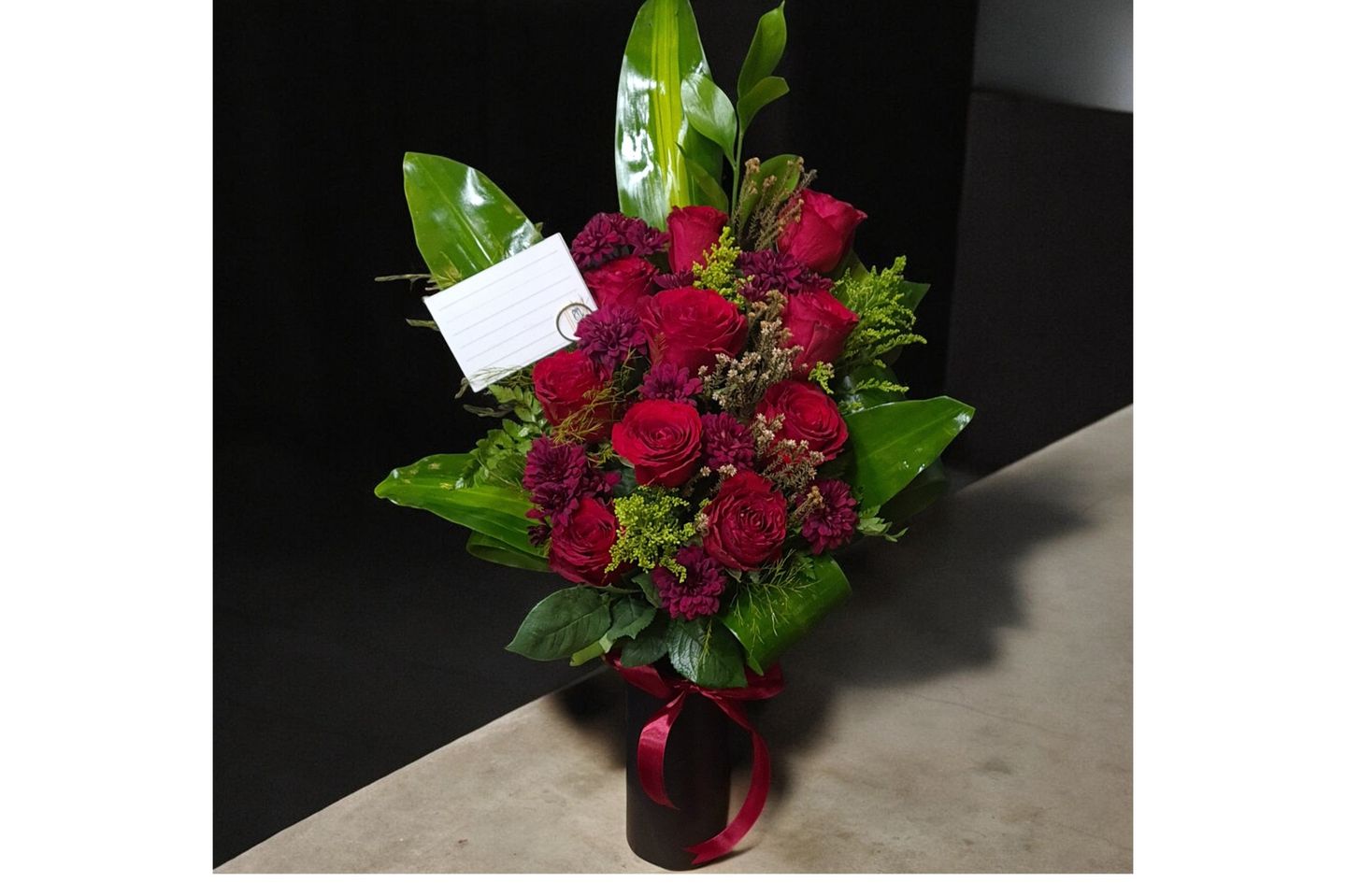 A Mixed Stand Bouquet Of Roses