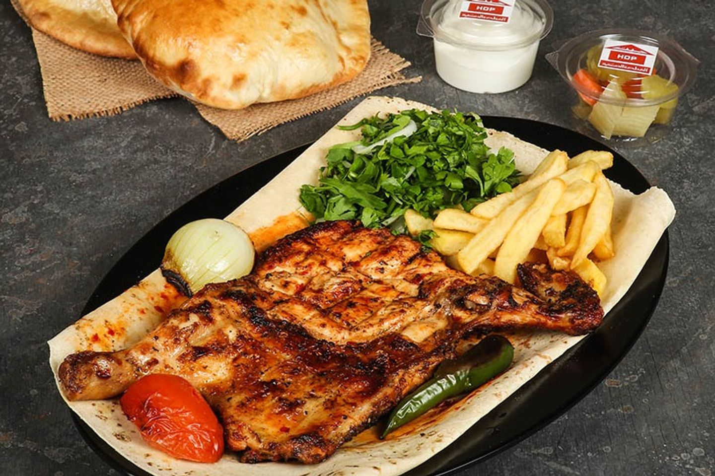 نص حبة دجاج على الفحم