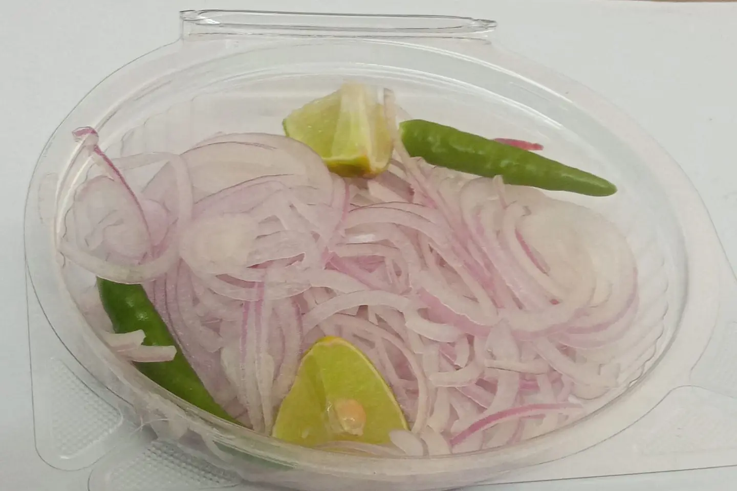 Salad Onion Lemon And Green Chili