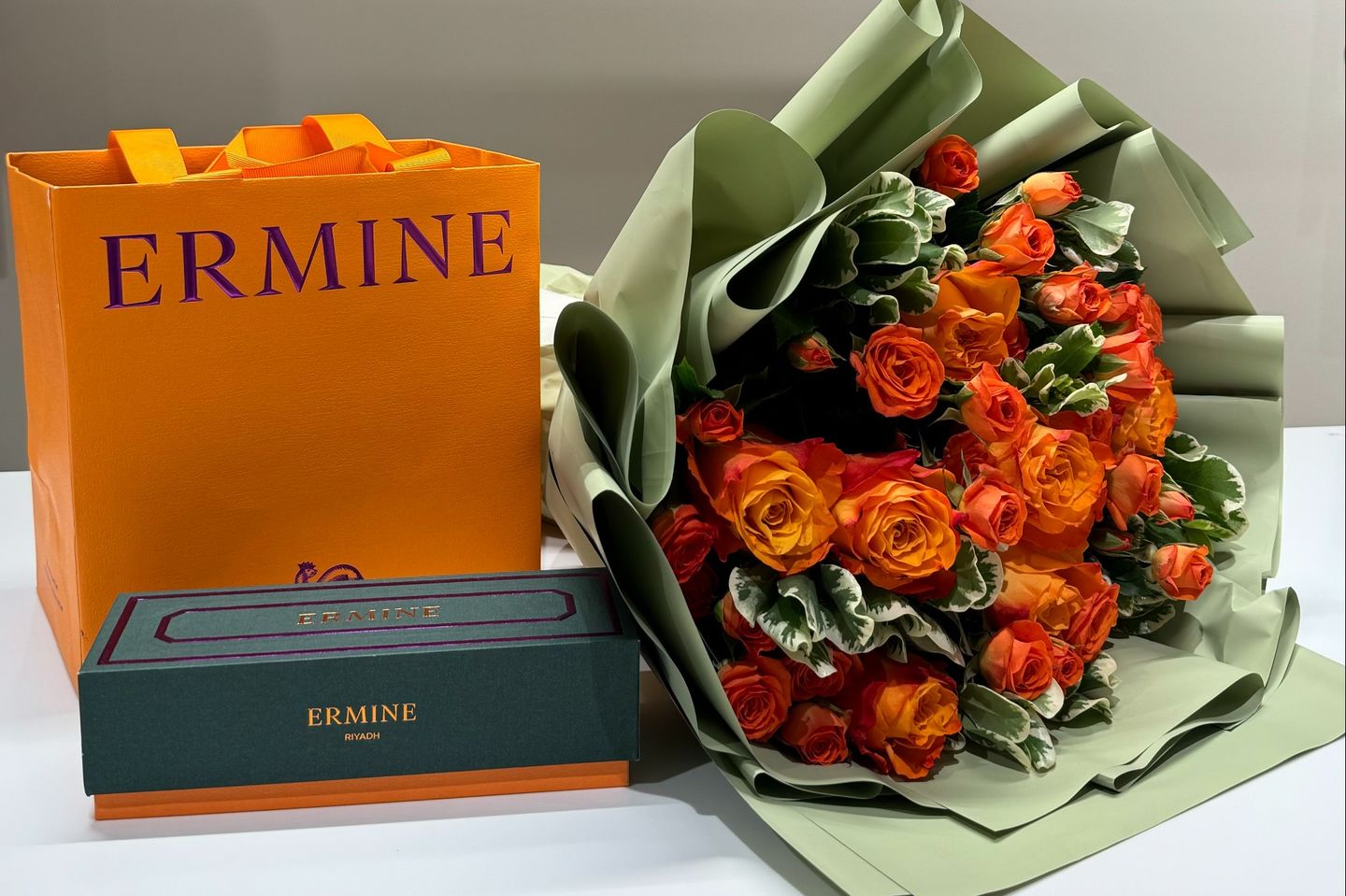 Ermine Macarons And A Bouquet Of Flowers