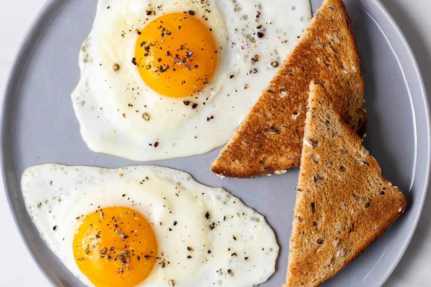 Two Fried Eggs And Toast
