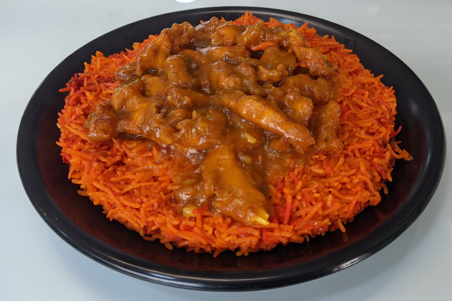دجاج خمسة وستين مع أرز