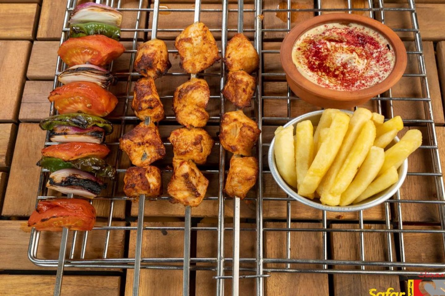 A Plate Of Grilled Chicken Pieces