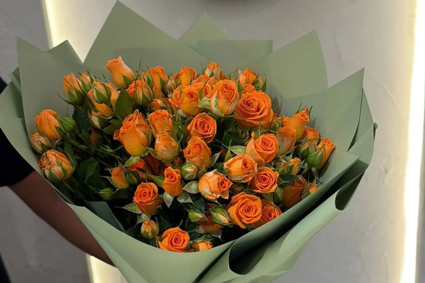 Green Bouquet With Orange Roses