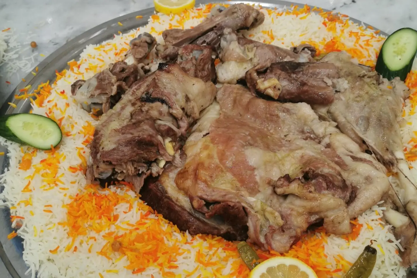 ربع تيس حنيذ