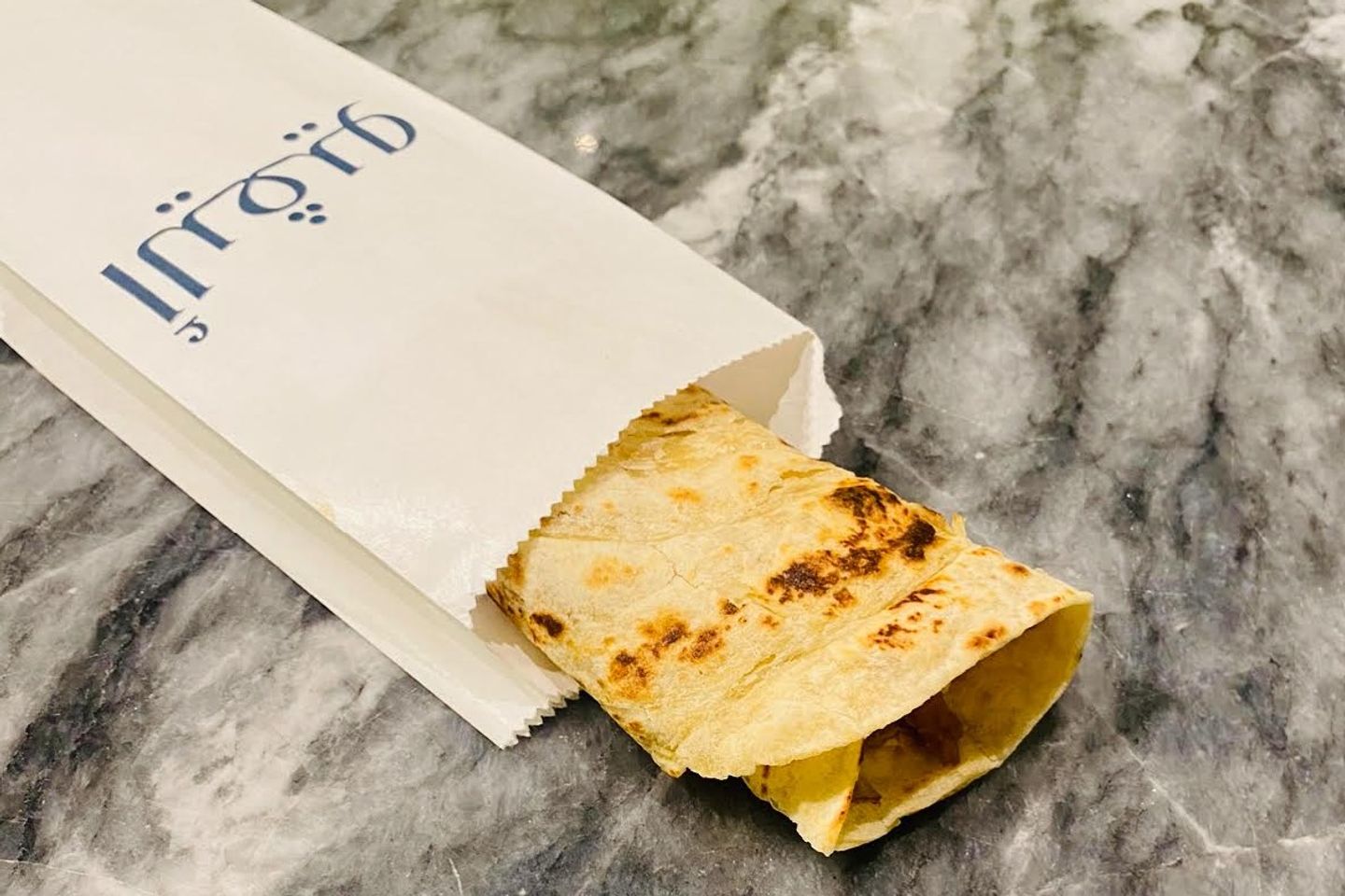 Chapati Omani Chips With Egg And Cheese