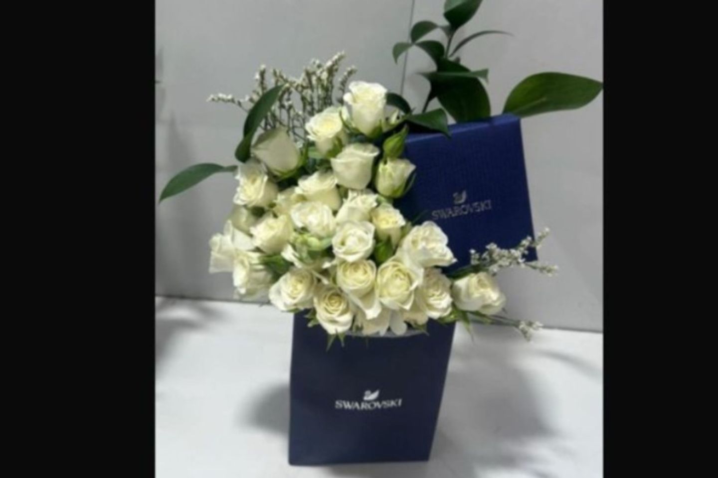 Swarovski Brand Chain With White Baby Jourie