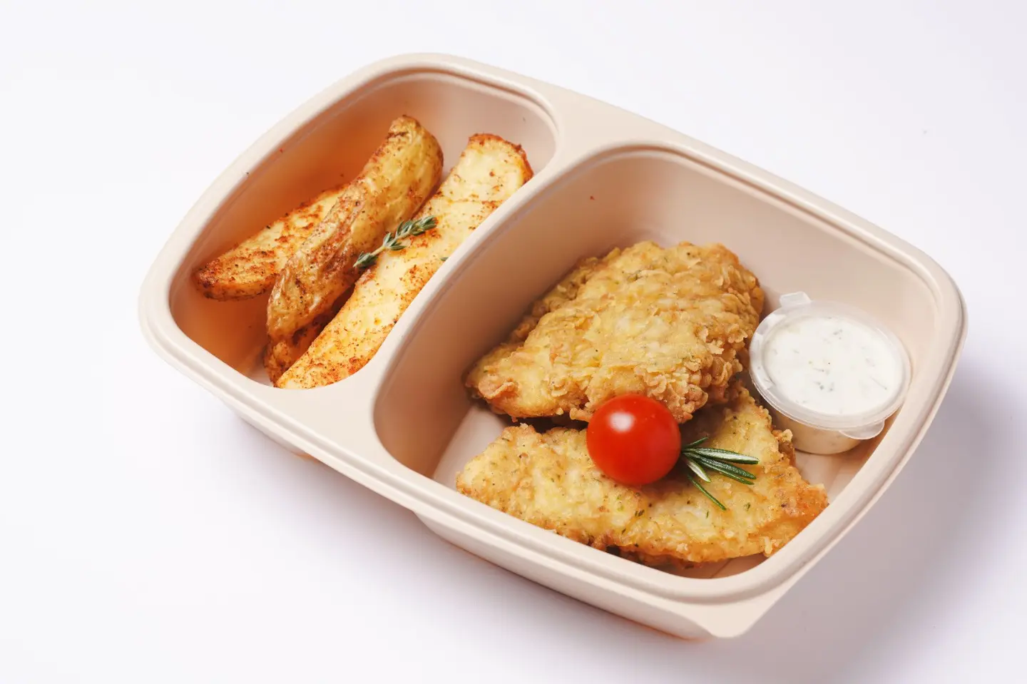 Fried Fish Fillet With Tartar Sauce And Potato Wedges