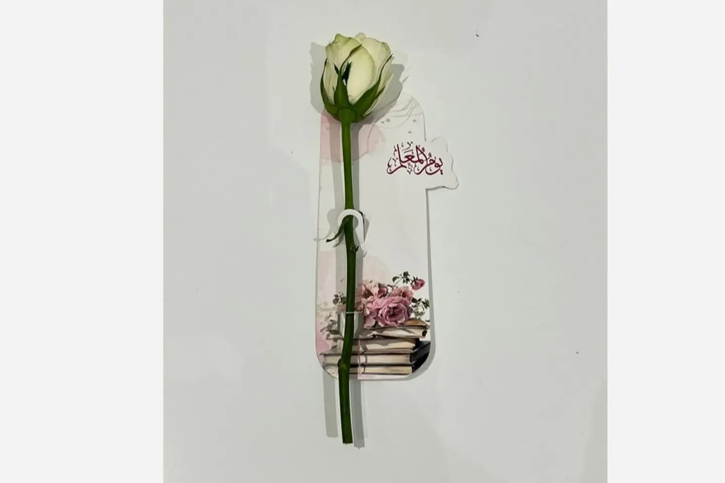 A Rose With A Teacher's Day Card