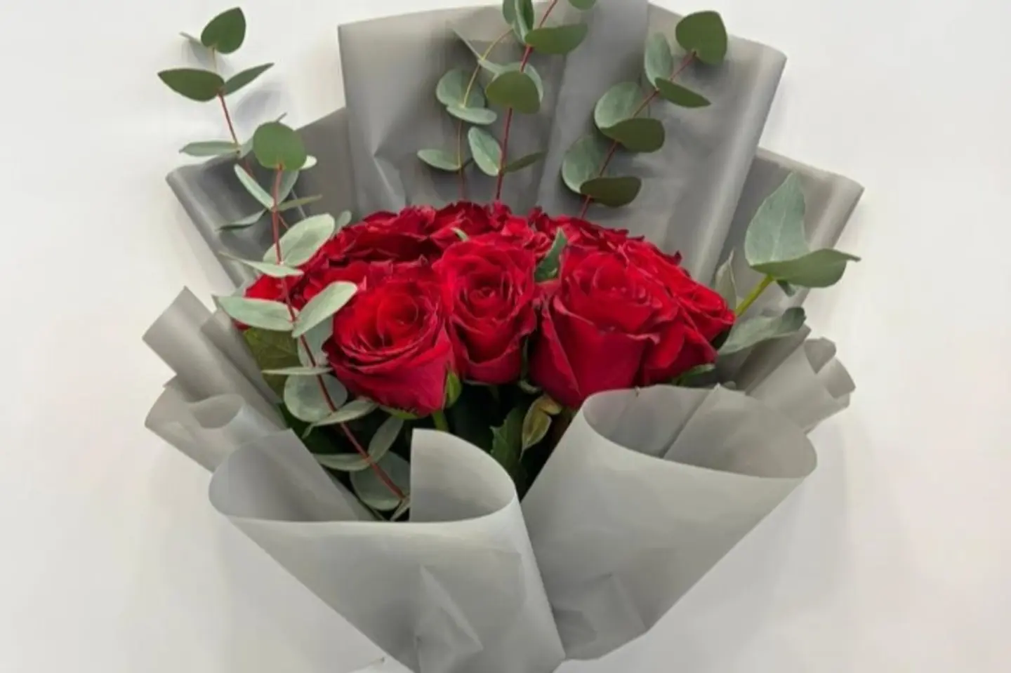 Red Roses With Eucalyptus Leaves