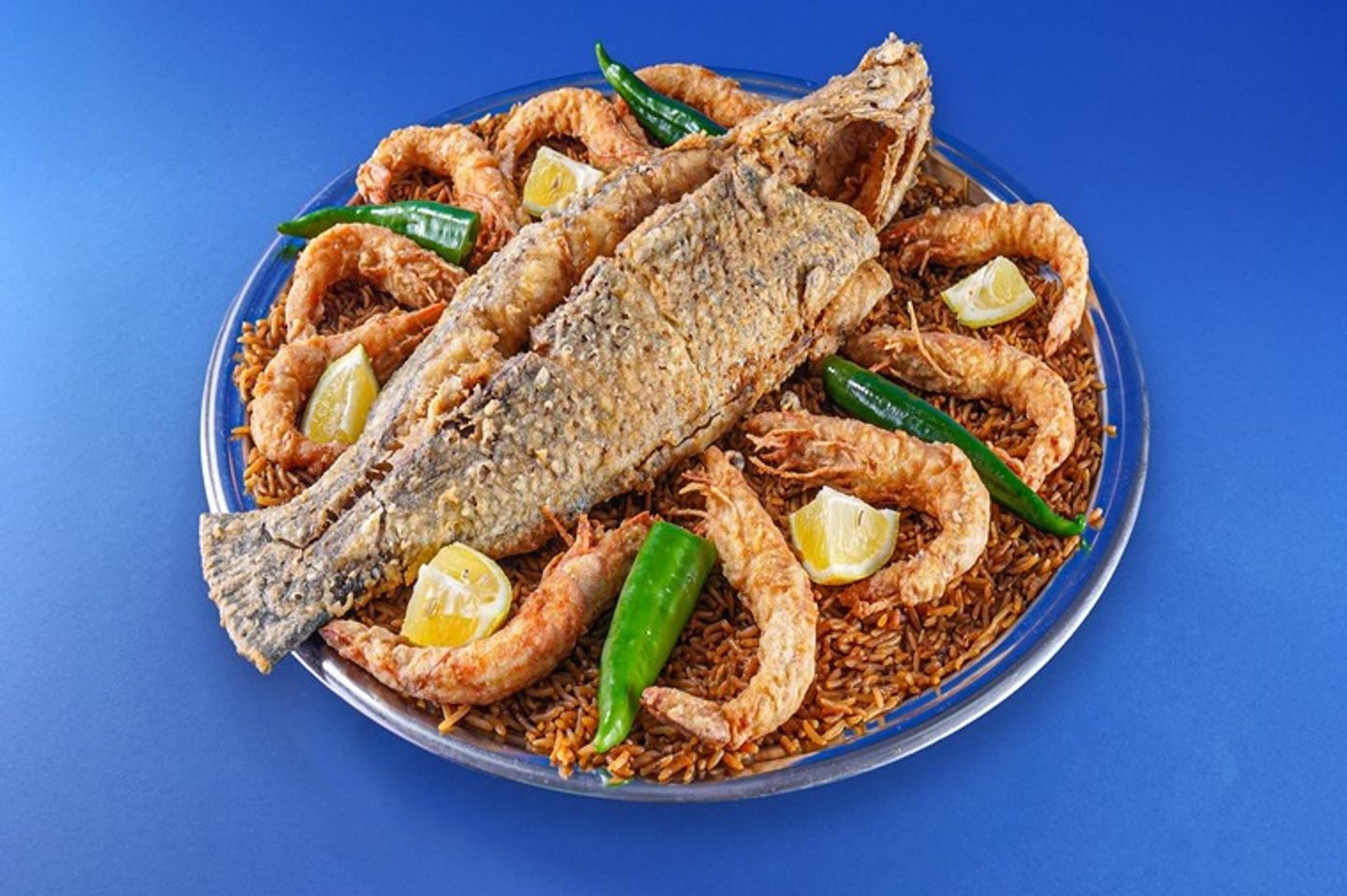 صينية قاروص محلى مقلى مع جمبرى