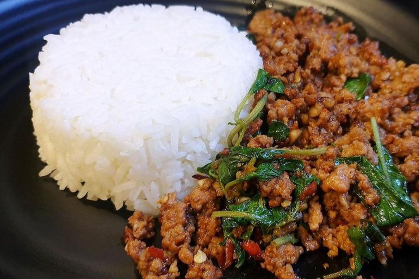 Beef With Basil Leaves And Rice