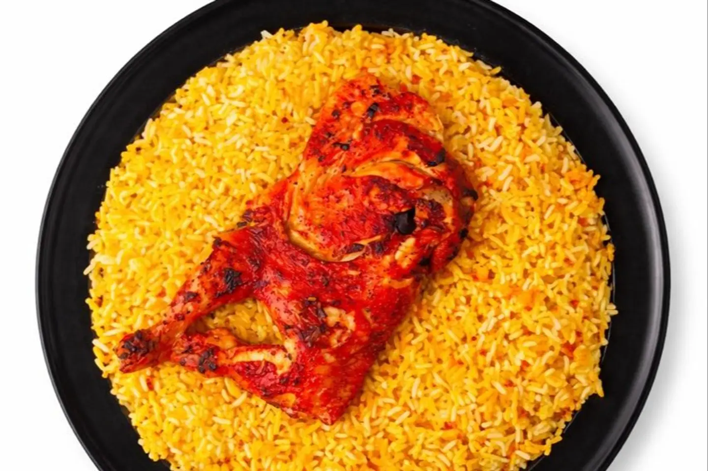 نصف حبة دجاج مظبي مع الرز المندي