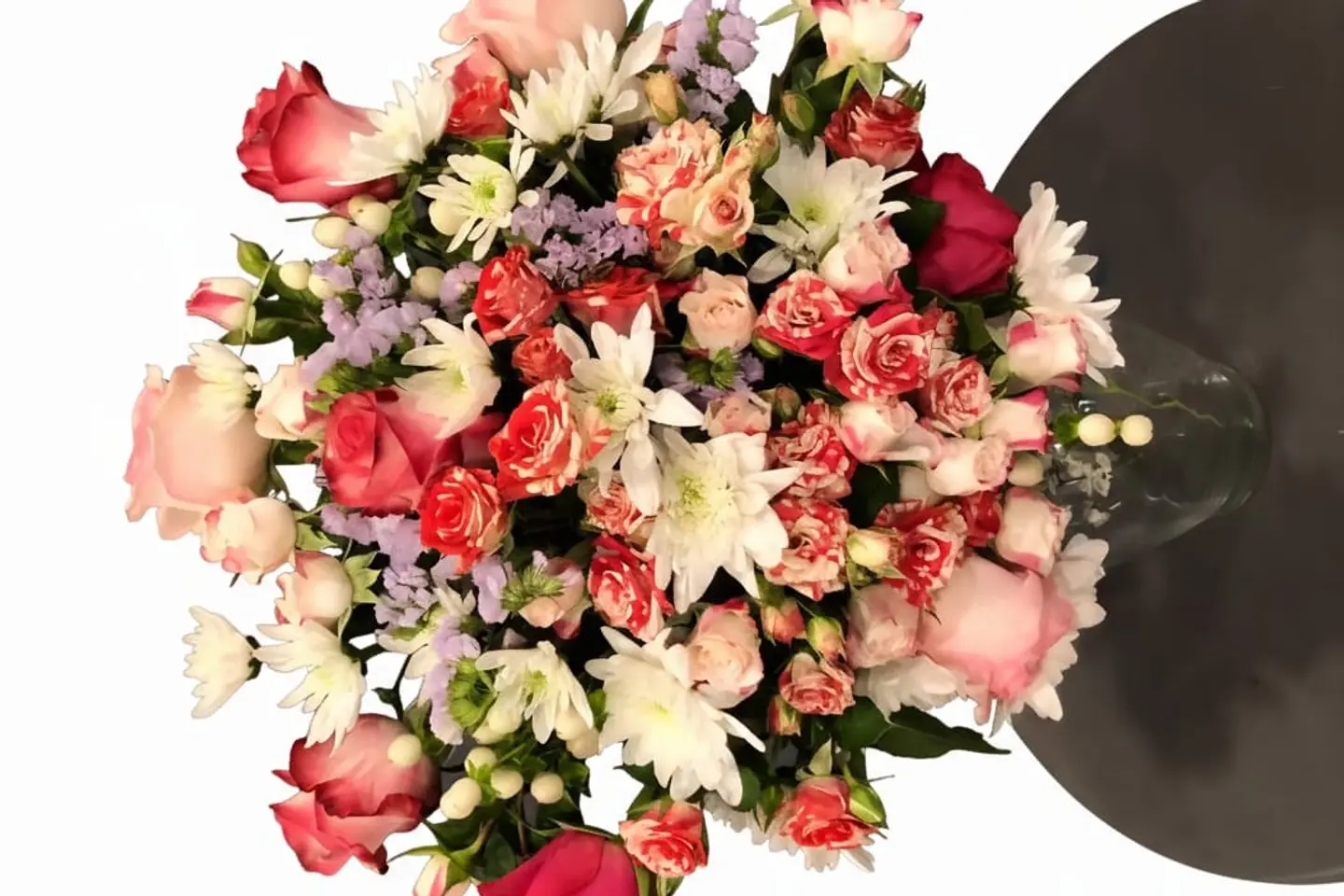 A Vase With Assorted Roses