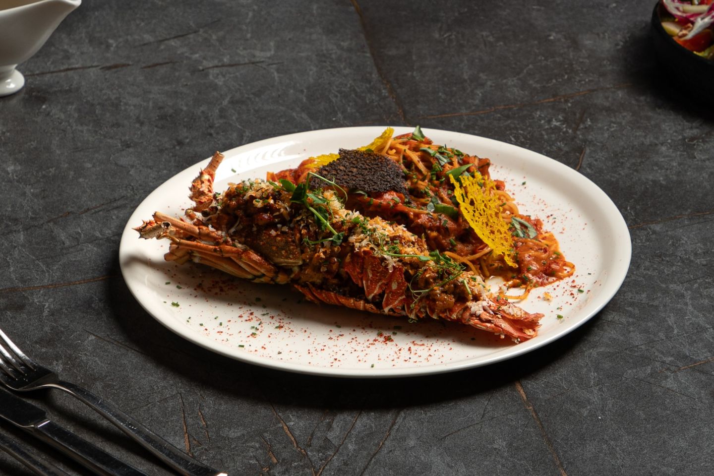 Lobster With A Creamy Cherry Tomato Sauce On The Vine