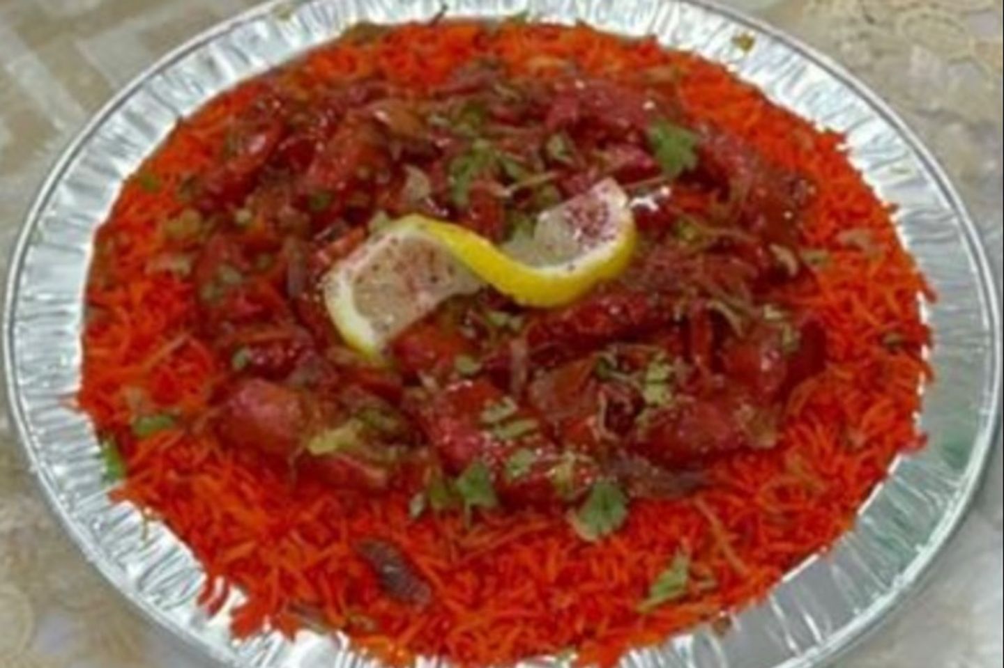برياني دجاج ٦٥ بالرز الأحمر