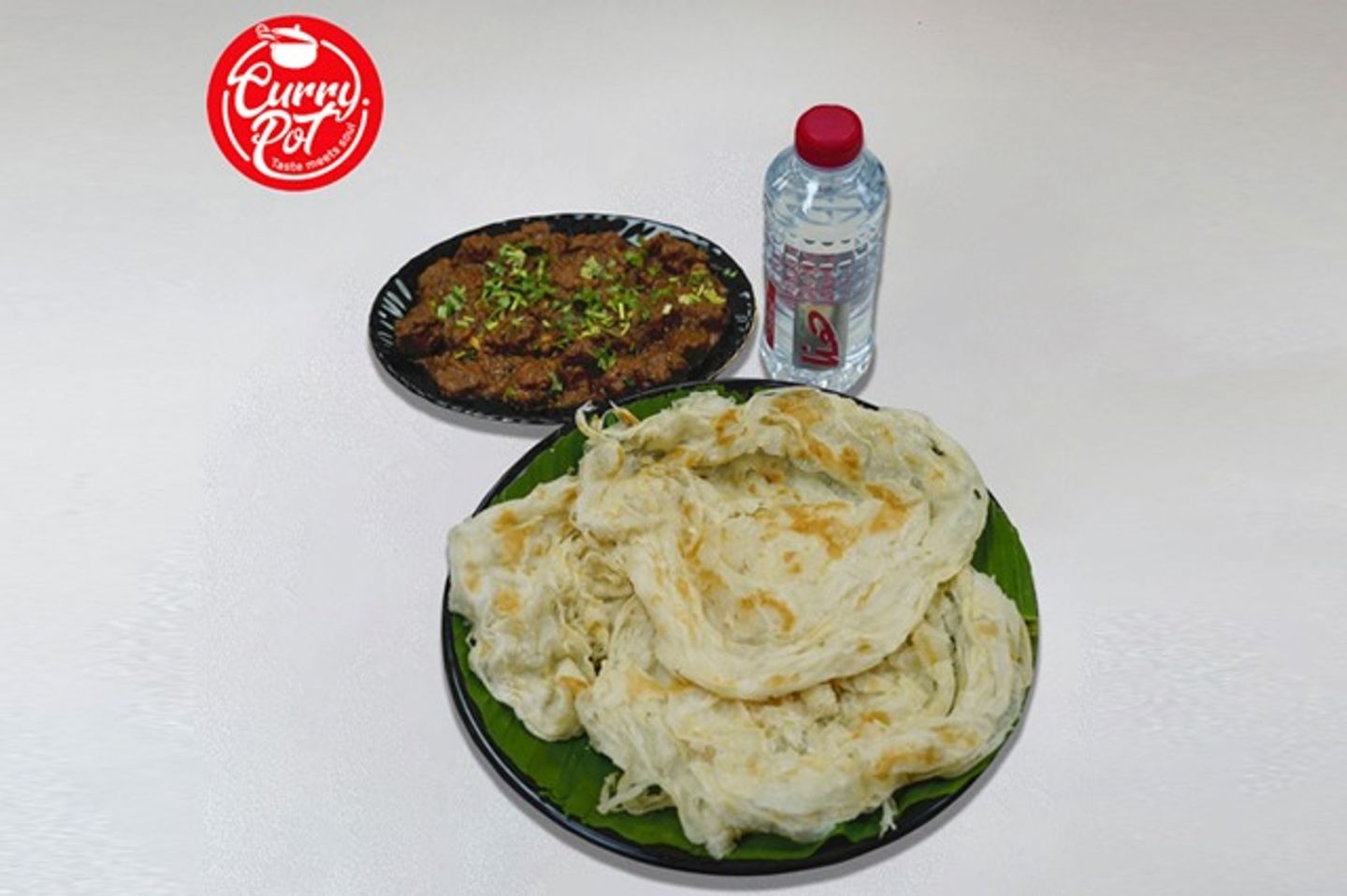 خبز بوروتا(٣ حبة) + لحم مشوي + مياه