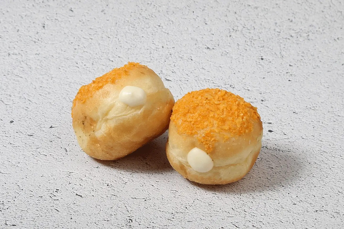 Salty Donuts Stuffed With Cheese Topped With Omani Chips