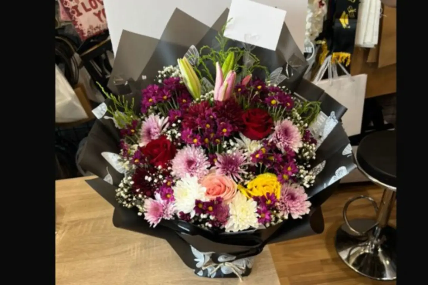 Mixed Rose Bouquet With Black Wrapping