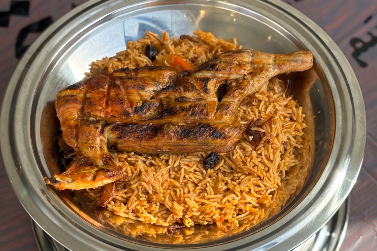 Half Chicken On Coal With Rice On Wood
