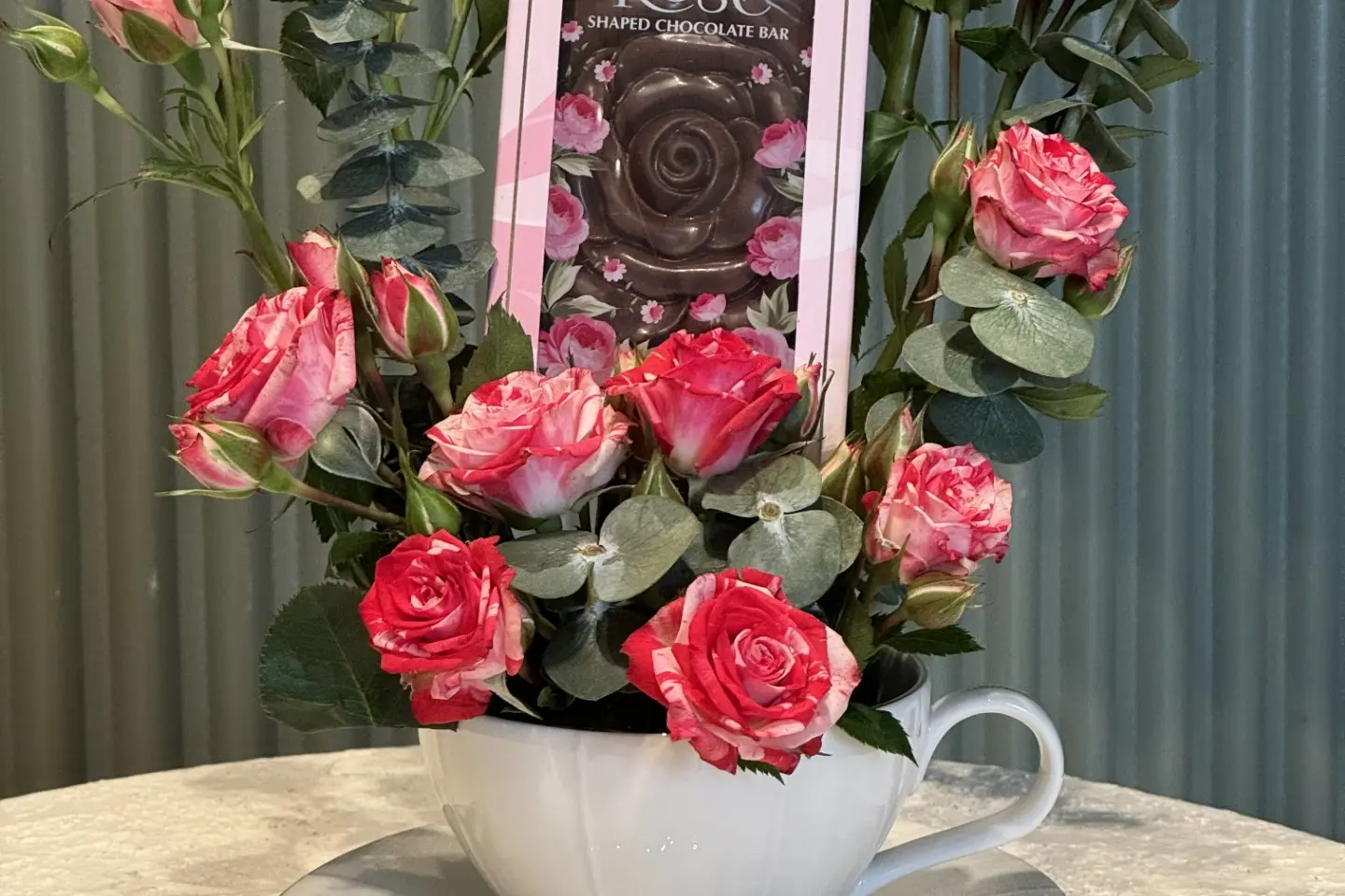 A Cup Of Flowers With Chocolate