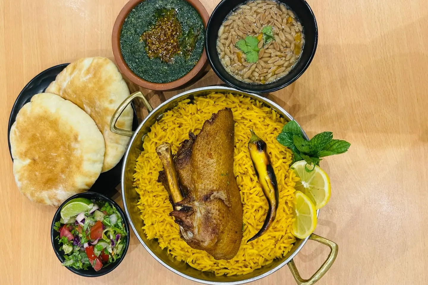 ربع بط + أرز +ملوخية + أرز