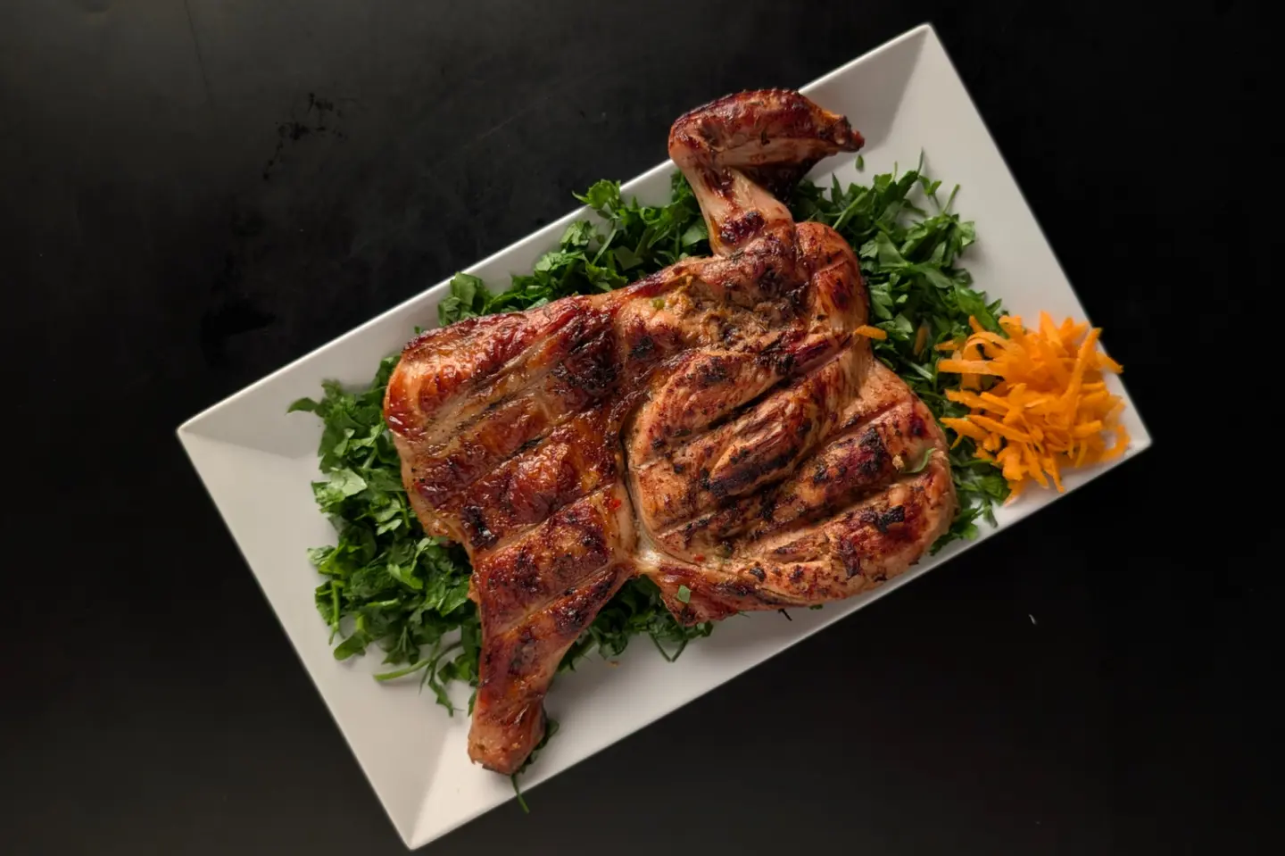 نصف دجاجة على الفحم