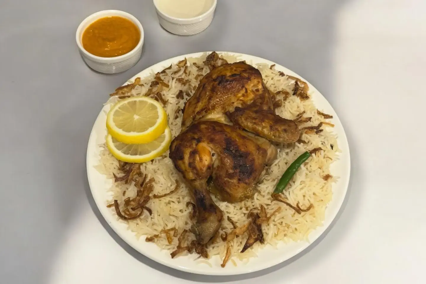 نص حبة دجاج فرن مع الرز