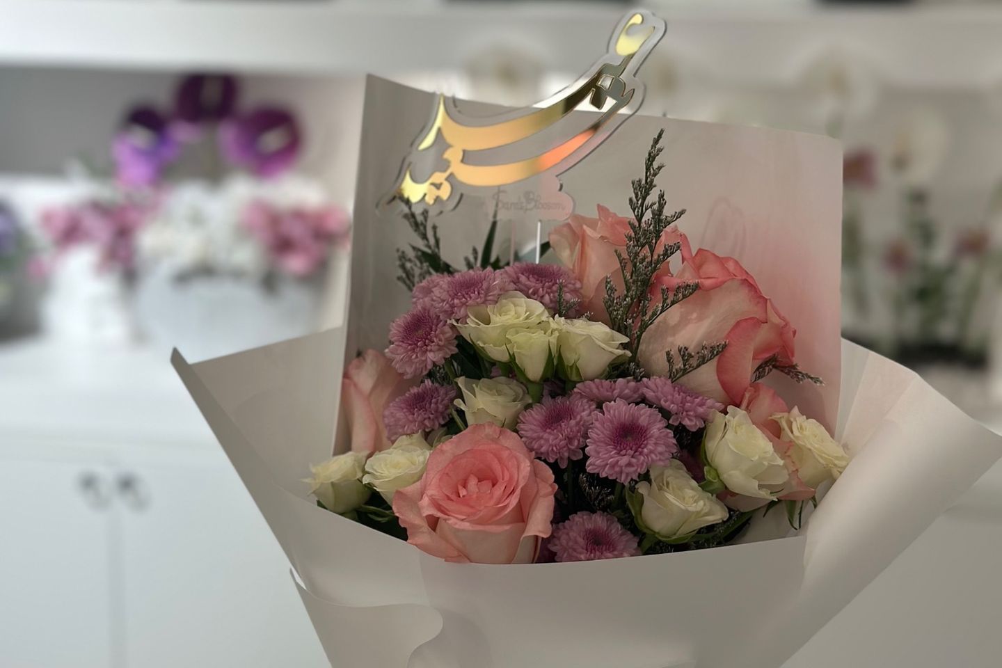 White And Pink Bouquet With White Wrapping