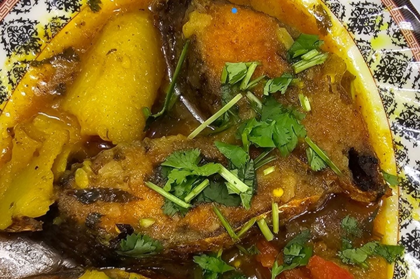 طبق سمك الهليشا مع الفطير