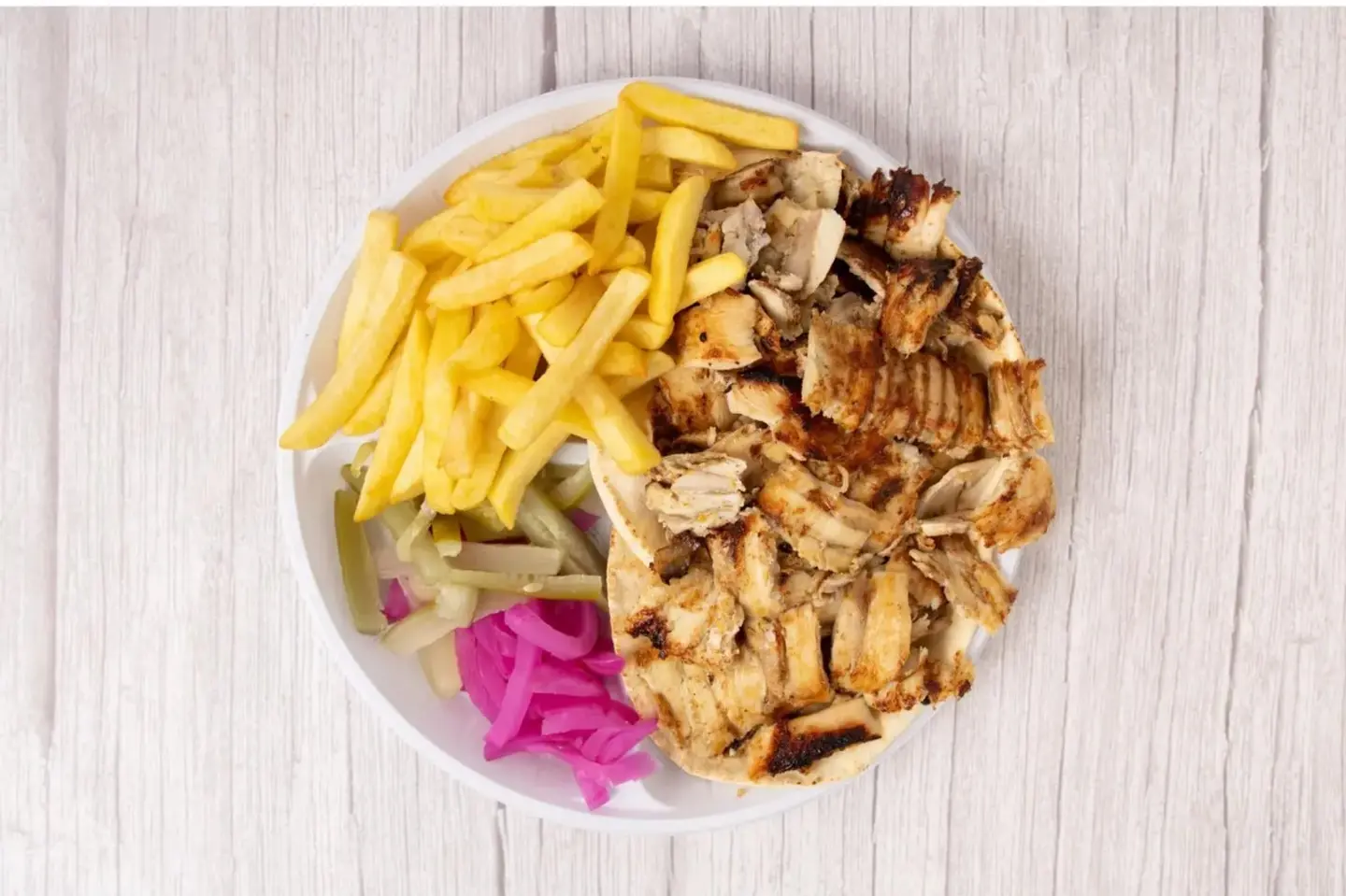 A Plate Of Chicken Shawarma